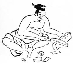 職人歌合に描かれた木櫛作りの職人の写真