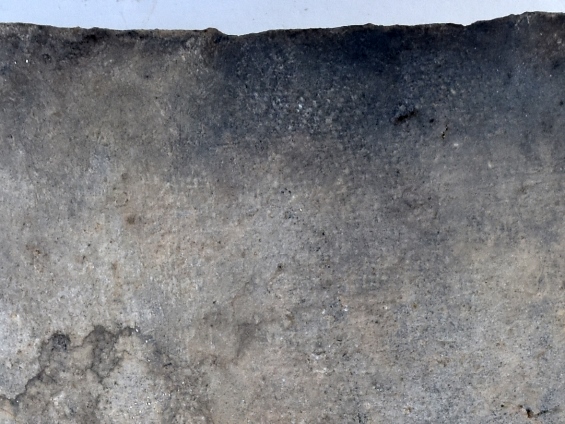 平安時代11世紀後半の平瓦の凹面に残る布目痕の写真